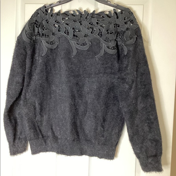 Black Sweater With Decorative Design at neck and shoulders - Picture 1 of 5
